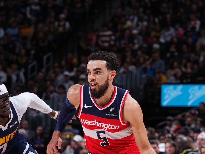 DENVER, CO - FEBRUARY 22: Tyus Jones #5 of the Washington Wizards dribbles the ball during the game against the Denver Nuggets on February 22, 2024 at the Ball Arena in Denver, Colorado. NOTE TO USER: User expressly acknowledges and agrees that, by downloading and/or using this Photograph, user is consenting to the terms and conditions of the Getty Images License Agreement. Mandatory Copyright Notice: Copyright 2024 NBAE (Photo by Garrett Ellwood/NBAE via Getty Images)