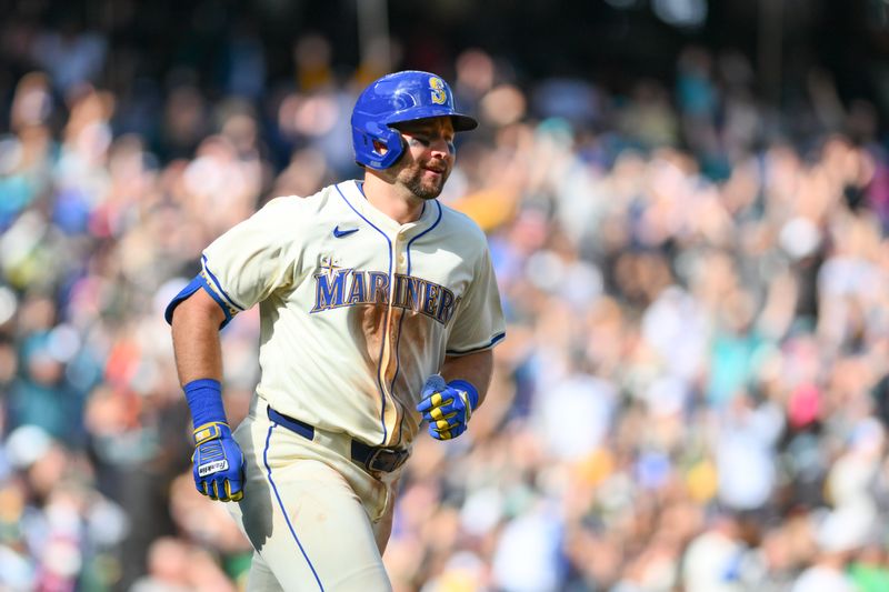 Sep 29, 2024; Seattle, Washington, USA; Seattle Mariners catcher Cal Raleigh (29) runs the bases after hitting a 2-run home run against the Oakland Athletics during the fifth inning at T-Mobile Park. Mandatory Credit: Steven Bisig-Imagn Images