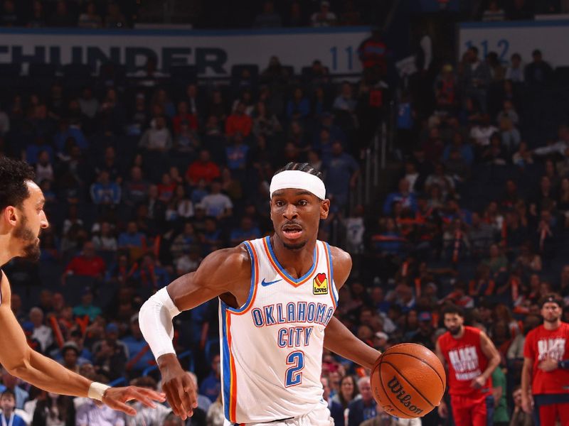 OKLAHOMA CITY, OK - FEBRUARY 23: Shai Gilgeous-Alexander #2 of the Oklahoma City Thunder handles the ball during the game against the Washington Wizards on February 23, 2024 at Paycom Arena in Oklahoma City, Oklahoma. NOTE TO USER: User expressly acknowledges and agrees that, by downloading and or using this photograph, User is consenting to the terms and conditions of the Getty Images License Agreement. Mandatory Copyright Notice: Copyright 2024 NBAE (Photo by Zach Beeker/NBAE via Getty Images)