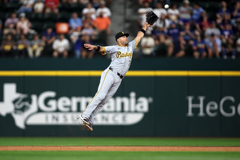 Aug 19, 2024; Arlington, Texas, USA; Pittsburgh Pirates second baseman Isiah Kiner-Falefa (7) cannot catch a line drive in the third inning against the Texas Rangers at Globe Life Field. Mandatory Credit: Tim Heitman-USA TODAY Sports