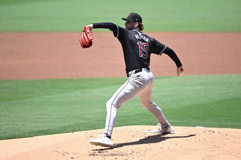 Jul 7, 2024; San Diego, California, USA; Arizona Diamondbacks starting pitcher Ryne Nelson (19) pitches against the San Diego Padres during the first inning at Petco Park. Mandatory Credit: Orlando Ramirez-USA TODAY Sports