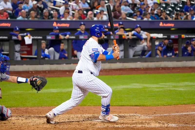 Jul 16, 2023; New York City, New York, USA; New York Mets second baseman Luis Guillorme (13) hits an RBI double against the Los Angeles Dodgers to win the game during the tenth inning at Citi Field. Mandatory Credit: Gregory Fisher-USA TODAY Sports