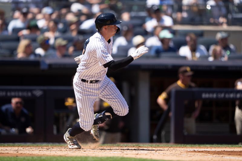 May 28, 2023; Bronx, New York, USA; New York Yankees catcher Kyle Higashioka (66) hits a double against the San Diego Padres during the third inning at Yankee Stadium. Mandatory Credit: Gregory Fisher-USA TODAY Sports