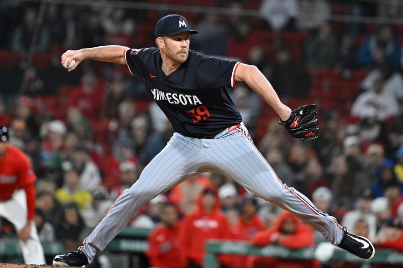 Sep 22, 2024; Boston, MA, USA;  Minnesota Twins pitcher Michael Tonkin (39) pitches against the Boston Red Sox during the sixth inning at Fenway Park. Mandatory Credit: Eric Canha-Imagn Images