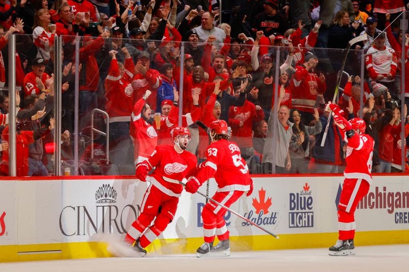 Dec 29, 2023; Detroit, Michigan, USA; Detroit Red Wings defenseman Jake Walman (96) celebrates his goal during the third period of the game between the Detroit Red Wings and the Nashville Predators at Little Caesars Arena. Mandatory Credit: Brian Bradshaw Sevald-USA TODAY Sports