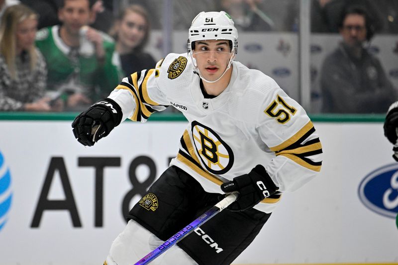 Nov 6, 2023; Dallas, Texas, USA; Boston Bruins center Matthew Poitras (51) skates against the Dallas Stars during the first period at the American Airlines Center. Mandatory Credit: Jerome Miron-USA TODAY Sports