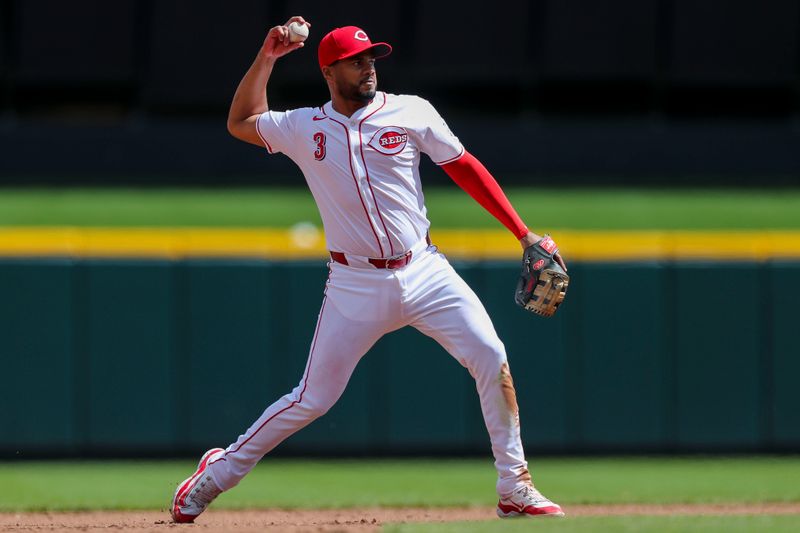 Apr 7, 2024; Cincinnati, Ohio, USA; Cincinnati Reds third baseman Jeimer Candelario (3) throws to first to get New York Mets catcher Francisco Alvarez (not pictured) out in the fifth inning at Great American Ball Park. Mandatory Credit: Katie Stratman-USA TODAY Sports