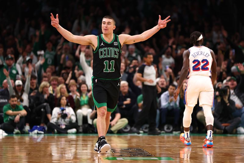 BOSTON, MASSACHUSETTS - DECEMBER 01: Payton Pritchard #11 of the Boston Celtics celebrates after hitting a three point shot against the Philadelphia 76ers during the second half at TD Garden on December 01, 2023 in Boston, Massachusetts. The Celtics defeat the 76ers 125-119. NOTE TO USER: User expressly acknowledges and agrees that, by downloading and or using this photograph, User is consenting to the terms and conditions of the Getty Images License Agreement.  (Photo by Maddie Meyer/Getty Images)