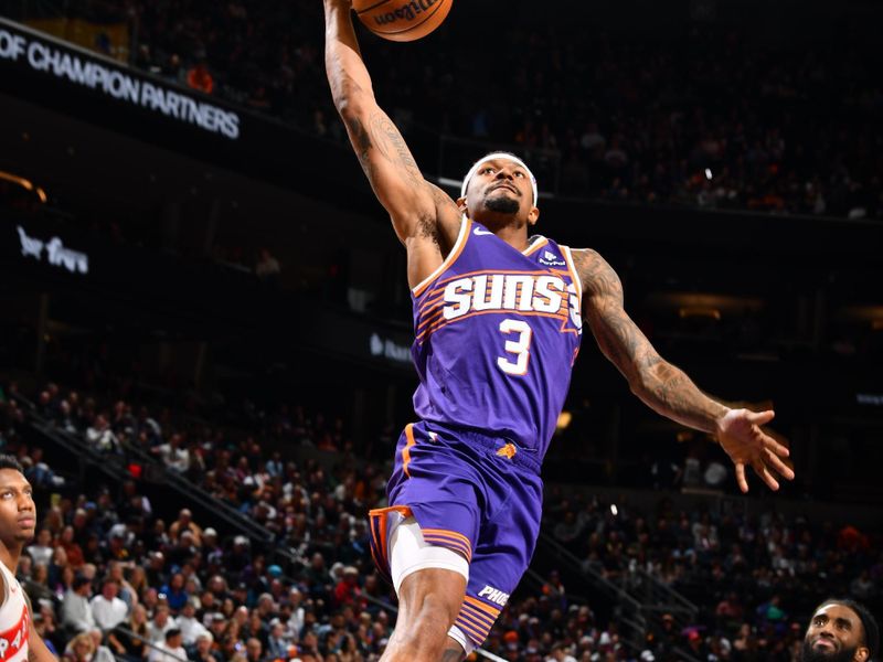 PHOENIX, AZ - MARCH 7: Bradley Beal #3 of the Phoenix Suns drives to the basket during the game against the Toronto Raptors on March 7, 2024 at Footprint Center in Phoenix, Arizona. NOTE TO USER: User expressly acknowledges and agrees that, by downloading and or using this photograph, user is consenting to the terms and conditions of the Getty Images License Agreement. Mandatory Copyright Notice: Copyright 2024 NBAE (Photo by Barry Gossage/NBAE via Getty Images)