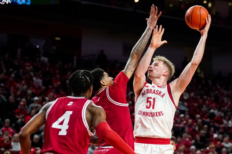 Jan 3, 2024; Lincoln, Nebraska, USA; Nebraska Cornhuskers forward Rienk Mast (51) shoots the ball against Indiana Hoosiers center Kel'el Ware (1) and forward Anthony Walker (4) during the first half at Pinnacle Bank Arena. Mandatory Credit: Dylan Widger-USA TODAY Sports