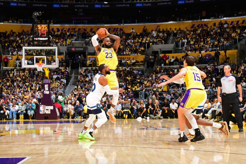 LOS ANGELES, CA - OCTOBER 22: LeBron James #23 of the Los Angeles Lakers passes the ball during the game against the Minnesota Timberwolves on October 22, 2024 at Crypto.Com Arena in Los Angeles, California. NOTE TO USER: User expressly acknowledges and agrees that, by downloading and/or using this Photograph, user is consenting to the terms and conditions of the Getty Images License Agreement. Mandatory Copyright Notice: Copyright 2024 NBAE (Photo by Adam Pantozzi/NBAE via Getty Images)