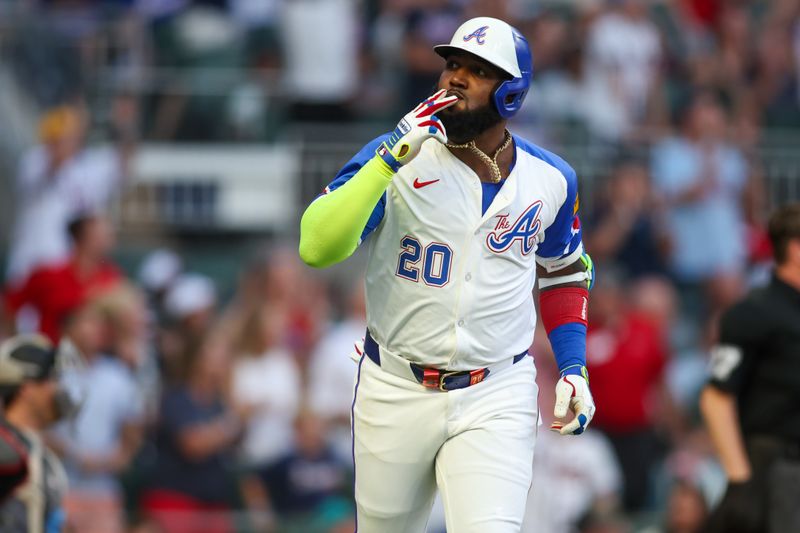 Aug 3, 2024; Atlanta, Georgia, USA; Atlanta Braves designated hitter Marcell Ozuna (20) reacts after a home run against the Miami Marlins in the third inning at Truist Park. Mandatory Credit: Brett Davis-USA TODAY Sports
