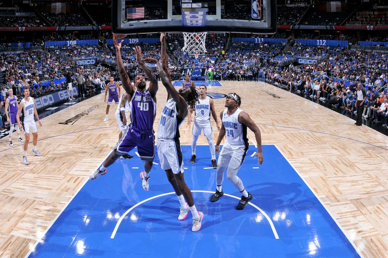 ORLANDO, FL -NOVEMBER 5: Harrison Barnes #40 of the Sacramento Kings drives to the basket against the Orlando Magic on November 5, 2022 at Amway Center in Orlando, Florida. NOTE TO USER: User expressly acknowledges and agrees that, by downloading and or using this photograph, User is consenting to the terms and conditions of the Getty Images License Agreement. Mandatory Copyright Notice: Copyright 2022 NBAE (Photo by Fernando Medina/NBAE via Getty Images)