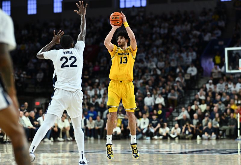 Michigan Wolverines Look to Upset Penn State Nittany Lions at Target Center with Star Performer...
