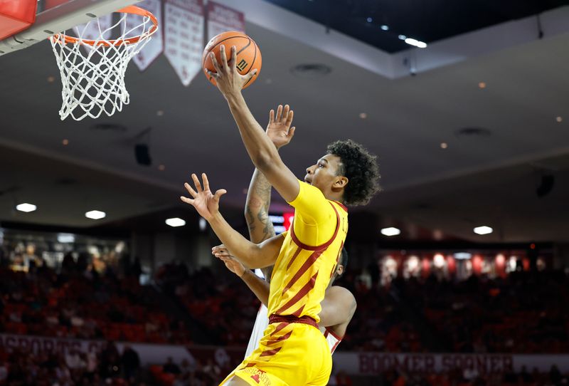 Jan 6, 2024; Norman, Oklahoma, USA; Iowa State Cyclones guard Curtis Jones (5) shoots against the Oklahoma Sooners during the first half at Lloyd Noble Center. Mandatory Credit: Alonzo Adams-USA TODAY Sports