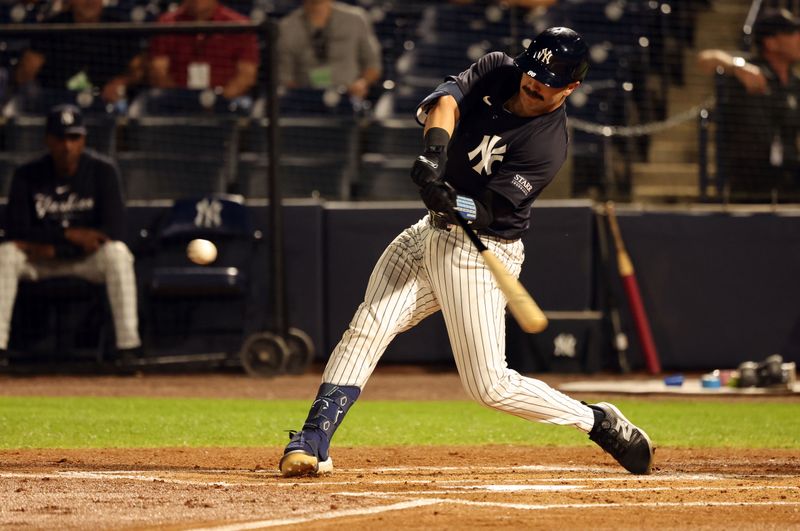 Mar 7, 2024; Tampa, Florida, USA; New York Yankees catcher Austin Wells (88) hits a two-RBI double during the first inning against the Detroit Tigers at George M. Steinbrenner Field. Mandatory Credit: Kim Klement Neitzel-USA TODAY Sports