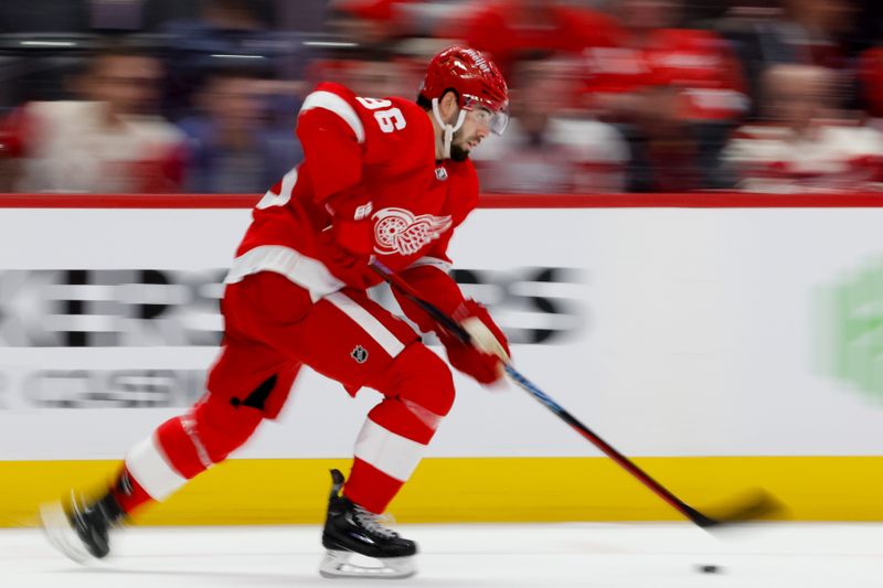 Feb 24, 2024; Detroit, Michigan, USA;  Detroit Red Wings defenseman Jake Walman (96) skates with the puck in the third period against the St. Louis Blues at Little Caesars Arena. Mandatory Credit: Rick Osentoski-USA TODAY Sports