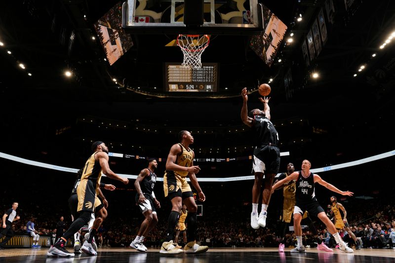 TORONTO, CANADA - JANUARY 26: Kawhi Leonard #2 of the LA Clippers rebounds the ball during the game against the Toronto Raptors on January 26, 2024 at the Scotiabank Arena in Toronto, Ontario, Canada.  NOTE TO USER: User expressly acknowledges and agrees that, by downloading and or using this Photograph, user is consenting to the terms and conditions of the Getty Images License Agreement.  Mandatory Copyright Notice: Copyright 2024 NBAE (Photo by Mark Blinch/NBAE via Getty Images)