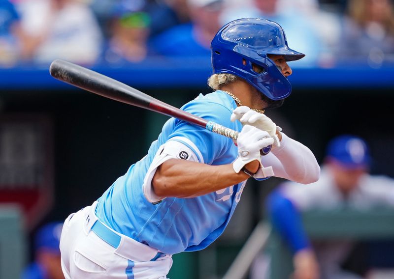 Apr 19, 2023; Kansas City, Missouri, USA; Kansas City Royals catcher MJ Melendez (1) hits a single during the fourth inning against the Texas Rangers at Kauffman Stadium. Mandatory Credit: Jay Biggerstaff-USA TODAY Sports