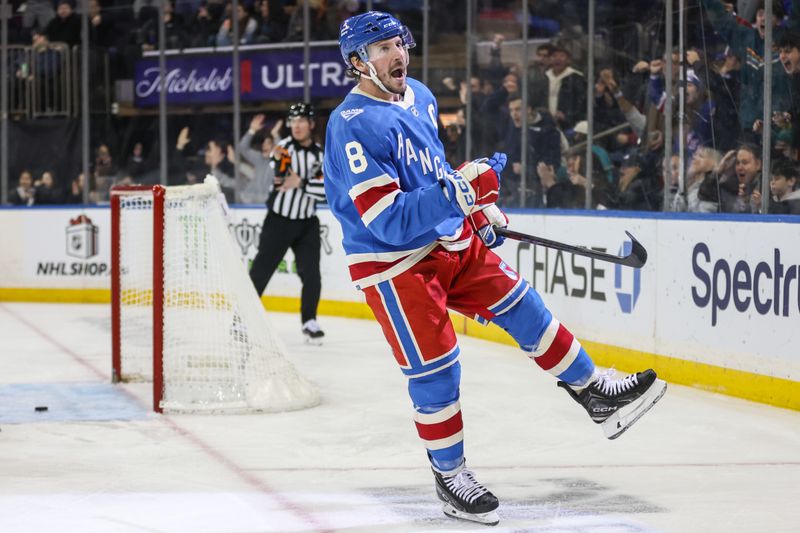 Dec 13, 2025; New York, New York, USA;  New York Rangers center J.T. Miller (8) celebrates after scoring a goal in the second period against the Montréal Canadiens at Madison Square Garden. Mandatory Credit: Wendell Cruz-Imagn Images