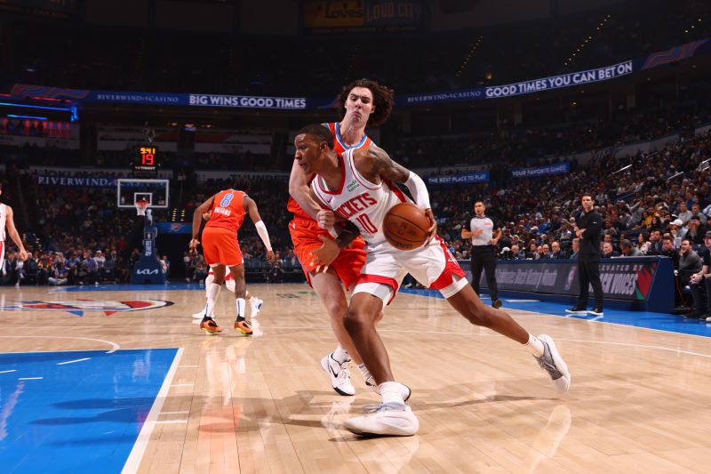 OKLAHOMA CITY, OK - FEBRUARY 27: Jabari Smith Jr. #10 of the Houston Rockets drives to the basket during the game against the Oklahoma City Thunder on February, 2024 at Paycom Arena in Oklahoma City, Oklahoma. NOTE TO USER: User expressly acknowledges and agrees that, by downloading and or using this photograph, User is consenting to the terms and conditions of the Getty Images License Agreement. Mandatory Copyright Notice: Copyright 2024 NBAE (Photo by Zach Beeker/NBAE via Getty Images)