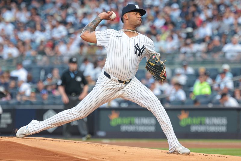 Jul 7, 2024; Bronx, New York, USA; New York Yankees starting pitcher Luis Gil (81) delivers a pitch during the first inning against the Boston Red Sox at Yankee Stadium. Mandatory Credit: Vincent Carchietta-USA TODAY Sports