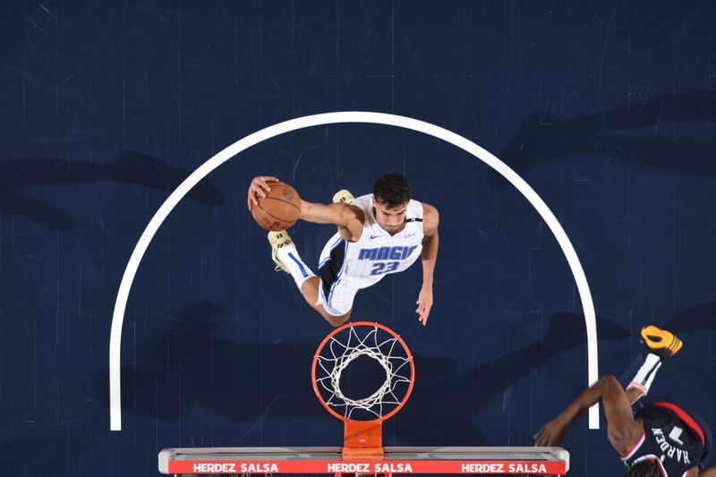 INGLEWOOD, CA - NOVEMBER 20: Tristan da Silva #23 of the Orlando Magic dunks the ball during the game against the LA Clippers on November 20, 2024 at Intuit Dome in Los Angeles, California. NOTE TO USER: User expressly acknowledges and agrees that, by downloading and/or using this Photograph, user is consenting to the terms and conditions of the Getty Images License Agreement. Mandatory Copyright Notice: Copyright 2024 NBAE (Photo by Juan Ocampo/NBAE via Getty Images)