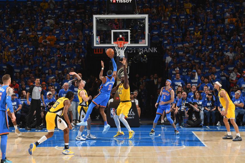 OKLAHOMA CITY, OK - JUNE 8: Shai Gilgeous-Alexander #2 of the Oklahoma City Thunder drives to the basket during the game against the Indiana Pacers during Game Two of the 2025 NBA Finals on June 8, 2025 at Paycom Center in Oklahoma City, Oklahoma. NOTE TO USER: User expressly acknowledges and agrees that, by downloading and or using this photograph, User is consenting to the terms and conditions of the Getty Images License Agreement. Mandatory Copyright Notice: Copyright 2025 NBAE (Photo by Jesse D. Garrabrant/NBAE via Getty Images)
