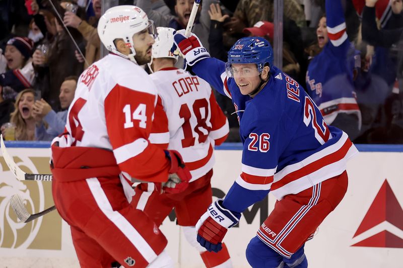 Nov 29, 2023; New York, New York, USA; New York Rangers left wing Jimmy Vesey (26) celebrates his game winning goal in front of Detroit Red Wings center Robby Fabbri (14) and center Andrew Copp (18) during the third period at Madison Square Garden. Mandatory Credit: Brad Penner-USA TODAY Sports