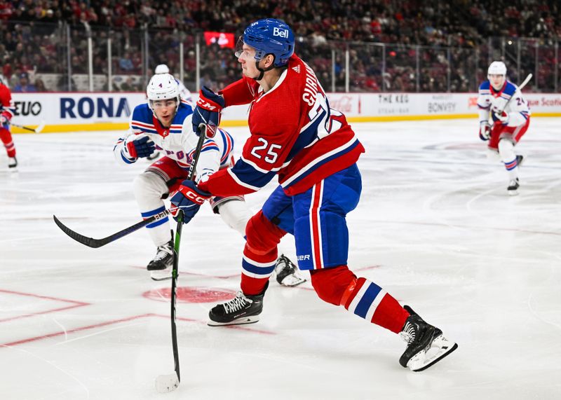 Mar 9, 2023; Montreal, Quebec, CAN; Montreal Canadiens right wing Denis Gurianov (25) shoots the puck against the New York Rangers during the second period at Bell Centre. Mandatory Credit: David Kirouac-USA TODAY Sports