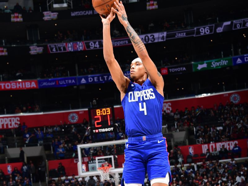 LOS ANGELES, CA - APRIL 12: Brandon Boston Jr. #4 of the LA Clippers shoots the ball during the game against the Utah Jazz on April 12, 2024 at Crypto.Com Arena in Los Angeles, California. NOTE TO USER: User expressly acknowledges and agrees that, by downloading and/or using this Photograph, user is consenting to the terms and conditions of the Getty Images License Agreement. Mandatory Copyright Notice: Copyright 2024 NBAE (Photo by Adam Pantozzi/NBAE via Getty Images)