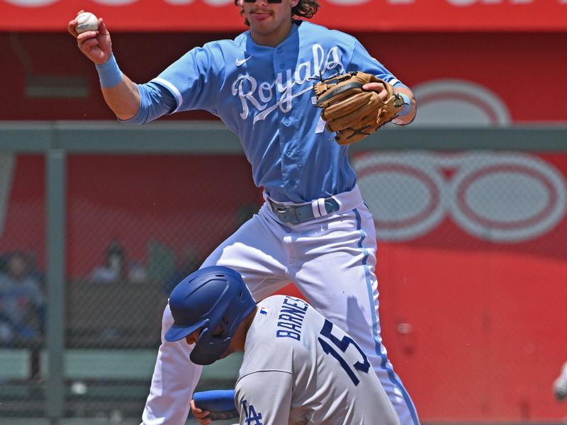 Jul 2, 2023; Kansas City, Missouri, USA;  Kansas City Royals shortstop Bobby Witt Jr. (7) forces out Los Angeles Dodgers catcher Austin Barnes (15) at second base in the third inning at Kauffman Stadium. Mandatory Credit: Peter Aiken-USA TODAY Sports