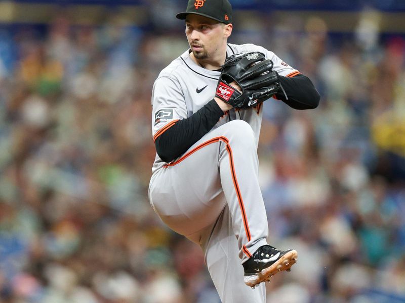 Apr 14, 2024; St. Petersburg, Florida, USA;  San Francisco Giants pitcher Blake Snell (7) throws a pitch against the Tampa Bay Rays in the fourth inning at Tropicana Field. Mandatory Credit: Nathan Ray Seebeck-USA TODAY Sports