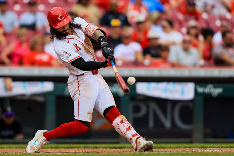 Jul 11, 2024; Cincinnati, Ohio, USA; Cincinnati Reds second baseman Jonathan India (6) hits a double in the eighth inning against the Colorado Rockies at Great American Ball Park. Mandatory Credit: Katie Stratman-USA TODAY Sports