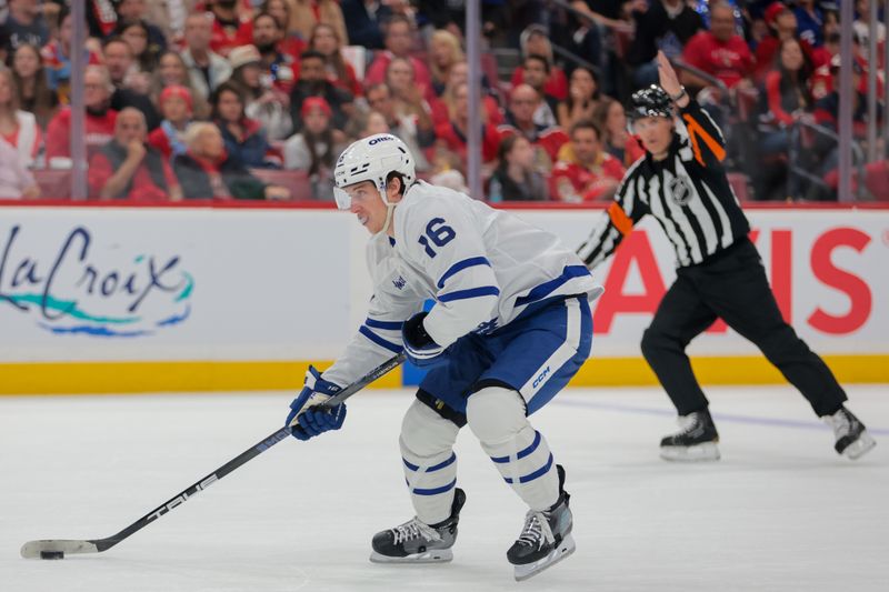 May 9, 2025; Sunrise, Florida, USA; Toronto Maple Leafs right wing Mitch Marner (16) moves the puck against the Florida Panthers during the first period in game three of the second round of the 2025 Stanley Cup Playoffs at Amerant Bank Arena. Mandatory Credit: Sam Navarro-Imagn Images