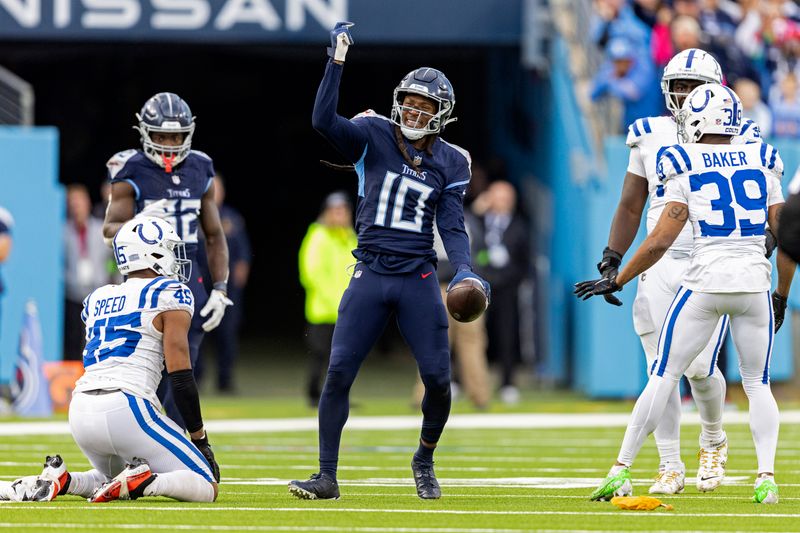 Tennessee Titans wide receiver DeAndre Hopkins (10) reacts to being interfered with by Indianapolis Colts linebacker E.J. Speed (45) on a play during their NFL football game Sunday, Dec. 3, 2023, in Nashville, Tenn. (AP Photo/Wade Payne)