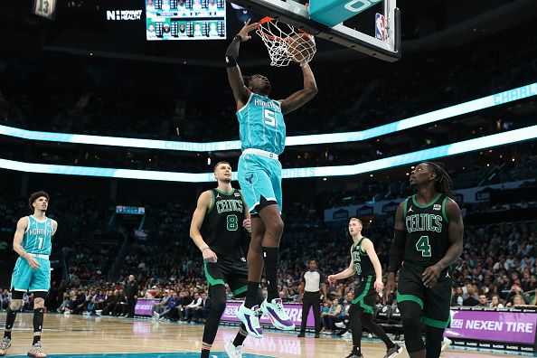 CHARLOTTE, NC - NOVEMBER 20: Mark Williams #5 of the Charlotte Hornets dunks the ball during the game against the Boston Celtics on November 20, 2023 at Spectrum Center in Charlotte, North Carolina. NOTE TO USER: User expressly acknowledges and agrees that, by downloading and or using this photograph, User is consenting to the terms and conditions of the Getty Images License Agreement.  Mandatory Copyright Notice:  Copyright 2023 NBAE (Photo by Brock Williams-Smith/NBAE via Getty Images)