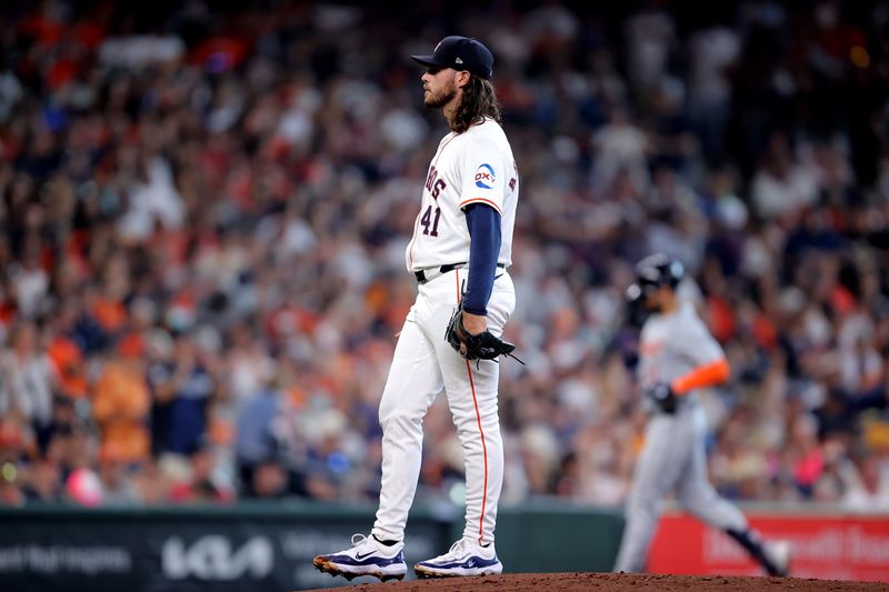 Jun 15, 2024; Houston, Texas, USA; Houston Astros starting pitcher Spencer Arrighetti (41) reacts after giving up a home run to Detroit Tigers center fielder Riley Greene (31) during the first inning at Minute Maid Park. Mandatory Credit: Erik Williams-USA TODAY Sports