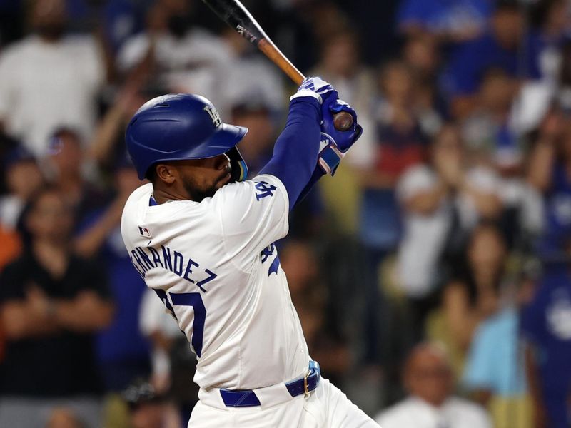 Jul 2, 2024; Los Angeles, California, USA;  Los Angeles Dodgers left fielder Teoscar Hernandez (37) hits a walk off hit to defeat the Arizona Diamondbacks  in bottom of the ninth inning at Dodger Stadium. Mandatory Credit: Kiyoshi Mio-USA TODAY Sports