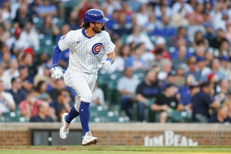 May 21, 2024; Chicago, Illinois, USA; Chicago Cubs shortstop Dansby Swanson (7) runs to first base after hitting a single against the Atlanta Braves during the second inning at Wrigley Field. Mandatory Credit: Kamil Krzaczynski-USA TODAY Sports