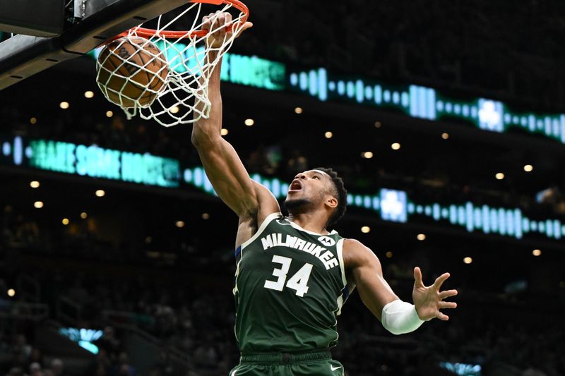 BOSTON, MASSACHUSETTS - OCTOBER 28: Giannis Antetokounmpo #34 of the Milwaukee Bucks dunks and scores against the Boston Celtics during the first half at the TD Garden on October 28, 2024 in Boston, Massachusetts. NOTE TO USER: User expressly acknowledges and agrees that, by downloading and or using this photograph, User is consenting to the terms and conditions of the Getty Images License Agreement. (Photo by Brian Fluharty/Getty Images)