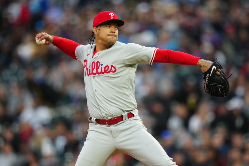 May 12, 2023; Denver, Colorado, USA; Philadelphia Phillies starting pitcher Taijuan Walker (99) delivers a pitch in the sixth inning against the Colorado Rockies at Coors Field. Mandatory Credit: Ron Chenoy-USA TODAY Sports