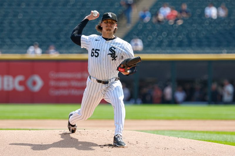 Sep 11, 2024; Chicago, Illinois, USA; Chicago White Sox starting pitcher Davis Martin (65) delivers a pitch against the Cleveland Guardians during the first inning at Guaranteed Rate Field. Mandatory Credit: Kamil Krzaczynski-Imagn Images