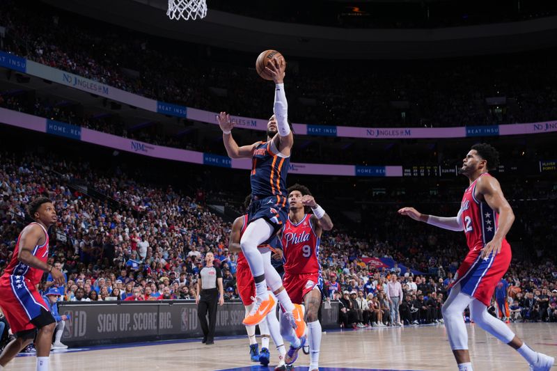 PHILADELPHIA, PA - APRIL 28: Jalen Brunson #11 of the New York Knicks drives to the basket during the game against the Philadelphia 76ers during Round 1 Game 4 of the 2024 NBA Playoffs on April 28, 2024 at the Wells Fargo Center in Philadelphia, Pennsylvania NOTE TO USER: User expressly acknowledges and agrees that, by downloading and/or using this Photograph, user is consenting to the terms and conditions of the Getty Images License Agreement. Mandatory Copyright Notice: Copyright 2024 NBAE (Photo by Jesse D. Garrabrant/NBAE via Getty Images)