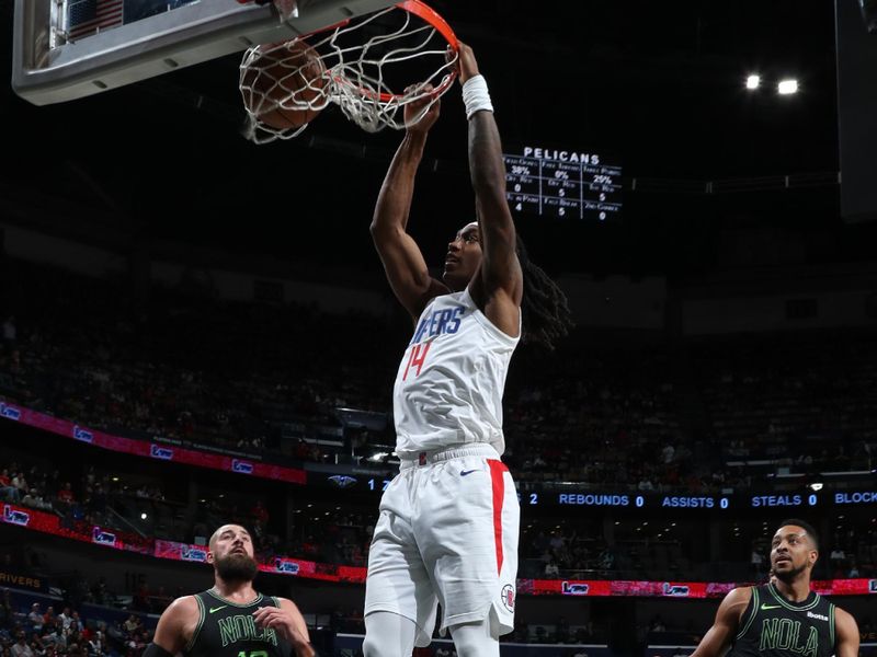 NEW ORLEANS, LA - MARCH 15: Terance Mann #14 of the LA Clippers dunks the ball during the game against the New Orleans Pelicans on March 15, 2024 at the Smoothie King Center in New Orleans, Louisiana. NOTE TO USER: User expressly acknowledges and agrees that, by downloading and or using this Photograph, user is consenting to the terms and conditions of the Getty Images License Agreement. Mandatory Copyright Notice: Copyright 2024 NBAE (Photo by Layne Murdoch Jr./NBAE via Getty Images)