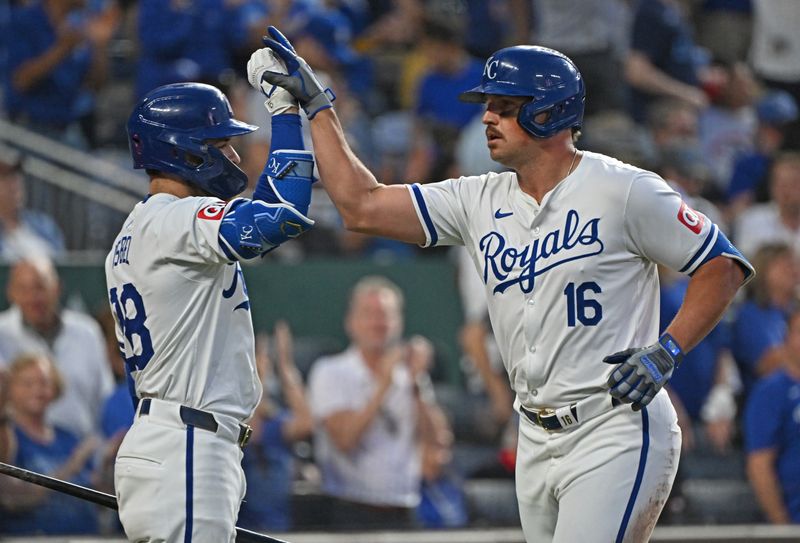 May 21, 2024; Kansas City, Missouri, USA;  Kansas City Royals right fielder Hunter Renfroe (16) celebrates with teammate Kyle Isbel (28) after hitting a solo home run in the seventh inning against the Detroit Tigers at Kauffman Stadium. Mandatory Credit: Peter Aiken-USA TODAY Sports