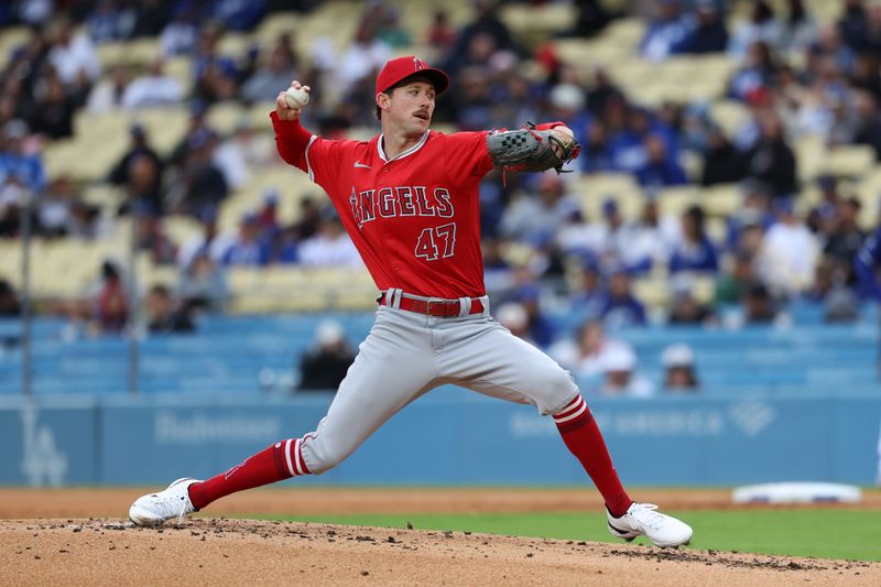 Mar 24, 2024; Los Angeles, California, USA;  Los Angeles Angels starting pitcher Griffin Canning (47) pitches during the first inning against the Los Angeles Dodgers at Dodger Stadium. Mandatory Credit: Kiyoshi Mio-USA TODAY Sports