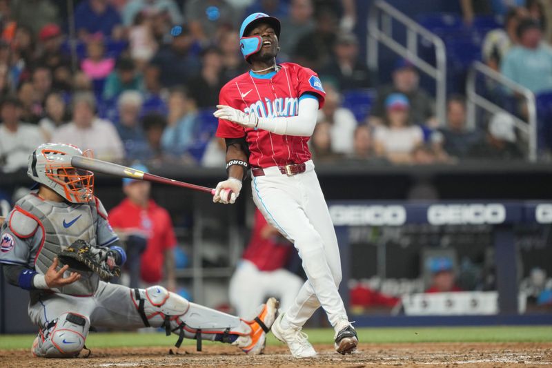 Jul 20, 2024; Miami, Florida, USA;  Miami Marlins left fielder Nick Gordon (1) strikes out against the New York Mets with runners in scoring position in the sixth inning at loanDepot Park. Mandatory Credit: Jim Rassol-USA TODAY Sports