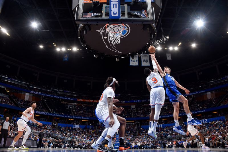 ORLANDO, FL - MARCH 23: Moritz Wagner #21 of the Orlando Magic shoots the ball during the game against the New York Knicks on March 23, 2023 at Amway Center in Orlando, Florida. NOTE TO USER: User expressly acknowledges and agrees that, by downloading and or using this photograph, User is consenting to the terms and conditions of the Getty Images License Agreement. Mandatory Copyright Notice: Copyright 2023 NBAE (Photo by Fernando Medina/NBAE via Getty Images)