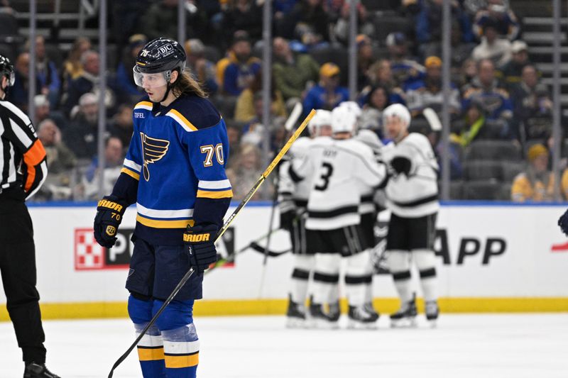 Jan 28, 2024; St. Louis, Missouri, USA; St. Louis Blues center Oskar Sundqvist (70) looks on after a goal from Los Angeles Kings center Jaret Anderson-Dolan (28) during the second period at Enterprise Center. Mandatory Credit: Jeff Le-USA TODAY Sports